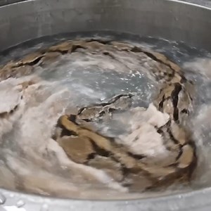 198K views · 1.4K reactions | luxury cloth and bags from python snake | AI Buzz | Facebook