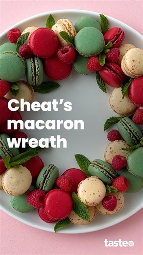 You're minutes away from this easy festive showstopper! Keep a few packs of these Christmas-inspired macarons from Coles in the freezer, then just arrange and serve. Brought to you by Coles More info in the comments. | Taste.com.au