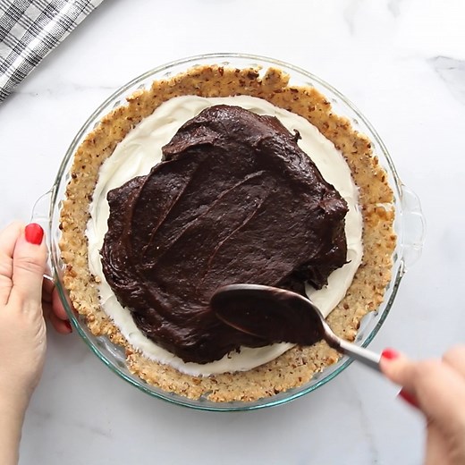 Arkansas Possum pie recipe has luscious chocolate and cream cheese layers. This tasty filling is inside a pecan crust for a delicious dessert. https://dessertsonadime.com/arkansas-possum-pie-recipe/ | Eating on a Dime