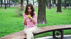 Beautiful Woman Sitting On Bench Park Stock Footage Video (100% Royalty-free) 11087978 | Shutterstock
