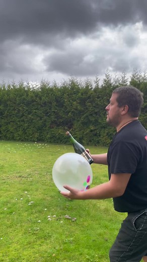 Balloon Confetti Explosion in a Garden Setting