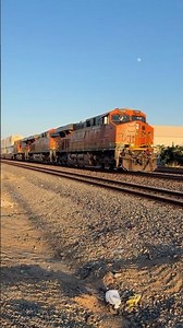 A BNSF Z train rides off into the sunset and gives a hornshow #bnsf #trains #railtrack #railway