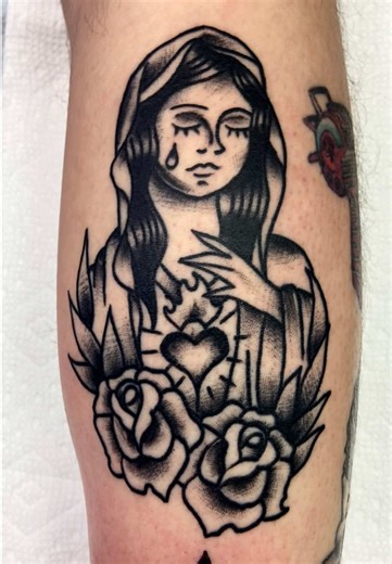 Traddy Virgin Mary Tattoo: A Traditional Design