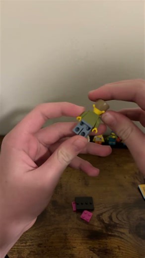 Opening a Lego simpsons minifigure