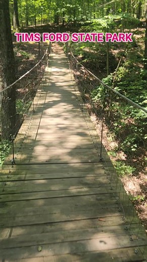 This is one of two swinging bridges that you will find on the trails at Tims Ford State Park. #outdooradventuresintennessee #simplelifebigadventures #Tennessee #exploretennessee #DiscoverTennessee #hike #hiking #swingingbridge #timsford #timsfordlake #winchestertennessee | Outdoor Adventures in Tennessee