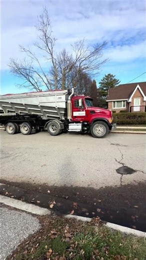 Mack stone slinger truck ready to unload soil