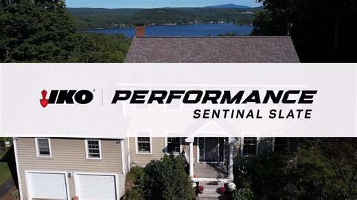 Discover the classic and upscale urban look of IKO Dynasty Performance #shingles in Sentinel Slate. These dramatic shingles pair perfectly with white or grey stone, brick or siding and black, white or grey trim. #CurbAppeal #IKOShingles *Availability varies by region | IKO Roofing