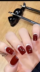 🍷 Wine red nails – classy at first glance Short square shape with a deep wine red tone and subtle glitter details ✨ Simple, elegant, and flattering on all skin tones. #reelsfacebook #nailsdesign #nailtrend #nailinspo #christmasnails | Stylish Nail Art Designs