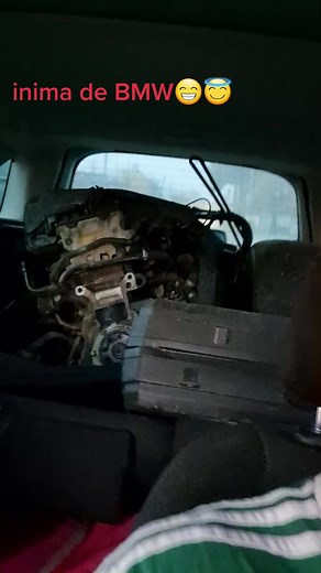 Exploring a Disassembled BMW Engine Compartment