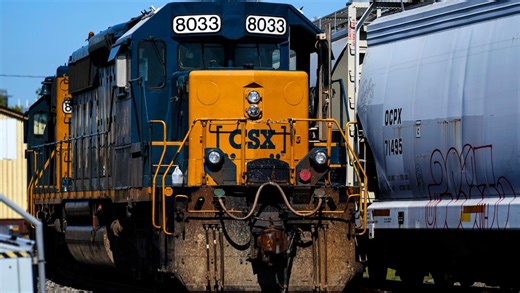 CSX railroad profit slips 2% as shipping demand remained weak and severance costs hurt results