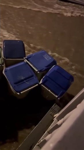 Street flooding in Milwaukee sweeps away trash bins amid more storms, heavy rainfall