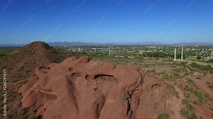 Papago Park Hole in the Rock in Phoenix Arizona. Aerial footage of hole in the rock on a sunny day with blue skies.