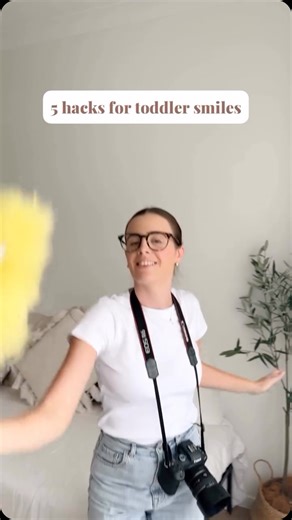 Struggling to get toddlers to smile for the camera? These 5 hacks are game-changers! 1. The “tickle stick” = instant giggles when it hits their feet. 2. Add a lens pet to your camera and ask: “What animal is on my camera? What sound do they make?” 3. “Do you like to throw things?” (Spoiler: they always do 😂) Try to catch it on your head! 4. Hide a sticker on your forehead and pretend you can’t find it. Kids love being the smart one! 5. Peek-a-boo, the classic. “Where’s Madi? Here I am!” Thanks 