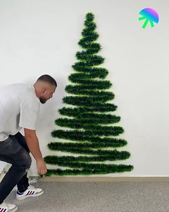 Wall Christmas tree decor video by Entice Studio | Between the Hammer