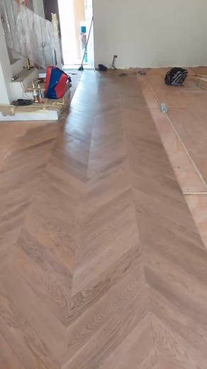 During installation chevron pattern oak #interiordesign #eyadelsabbah #woodwork #flooring #naturalwood #engineeredwood #woodart #craftsmanship | Eyad El-sabbah Wood Industries