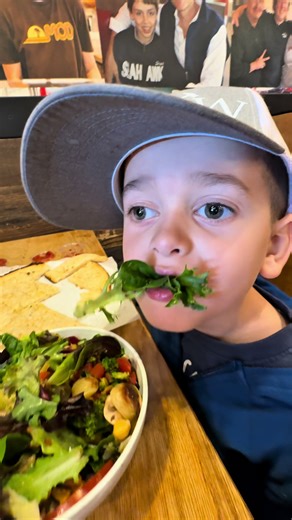 Can you guess what Kingston’s favorite menu item is @MOD Pizza? It’s crispy soft 🤣 Check out the SURPRISE T-shirts in our store! Support family owned small businesses 🙌 (Linktree in bio) @Kingston's Workshop #surprisekid #pizza #restaurant #cheese #bread