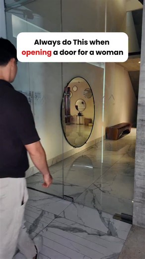 How to open a door for a woman Most guys just hold the door and let her figure it out. You open it. You go first. You guide her in. That’s leadership. ⬇️ If you’re inside - open it and invite her through. Details matter. Follow @larsmichael_ for social confidence | LarsMichael