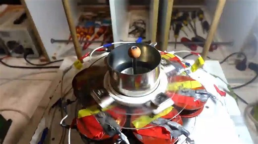 Now I have found a "spin / counter-spin" interaction for my new UFO model, which is flat, quiet, and matches exactly, how the inner spinning magnet is supposed to move, relative to an outer, counter-spinning flywheel of 4 magnets. The whole device is driven by 3 central wire coils with U-V-W power, and 6 outer wire coils with U-V-W-U-V-W power.The inner spinning magnet is attracted to those outer 4 ring magnets, and TRIES to make them move upward, as both rotors spin and counter-spin at a relati