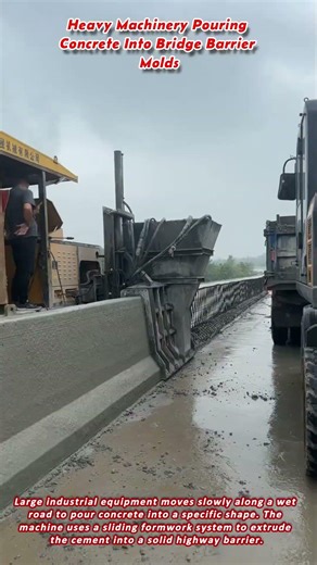 Heavy Machinery Pouring Concrete Into Bridge Barrier Molds