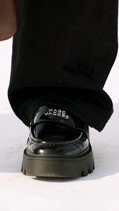 The Cristina Tote and Xiao Wen Ju take break on the set of our Marc Jacobs Fall 25 campaign. Sculptural, effortless and unforgettable, the Cristina Tote is ready to hold it all. Find her on marcjacobs.com and in selected stores. | Marc Jacobs