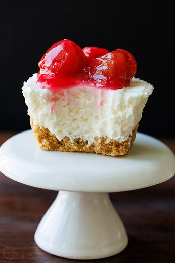 These beautiful No-Bake Mini Cheesecakes have a buttery graham cracker crust and an irresistible creamy filling. RECIPE: https://natashaskitchen.com/no-bake-mini-cheesecakes/ | NatashasKitchen.com