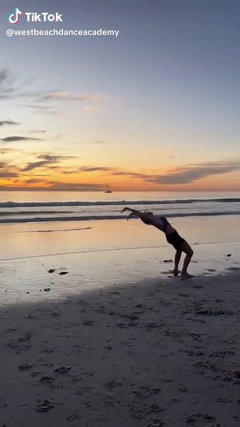 Acro on the beach 🫶🏼 #acro #acrobatics #beach #sunsets #adelaide #danceschool #dancestudio #dancevideo #dancetok #acrotok #circus #dancerlife #chasingsunsets #australia #valentinesday #backhandspring #roundoffbackhandspring #arialarts