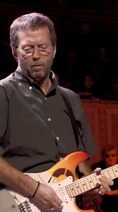 On this day in 2002: Eric Clapton performed "While My Guitar Gently Weeps" live with Paul McCartney and Ringo Starr, and took on the role of Musical Director for an all-star tribute concert honoring George Harrison. The concert was later released on CD and DVD. Eric played lead guitar on the original recording of The Beatles song. | Eric Clapton