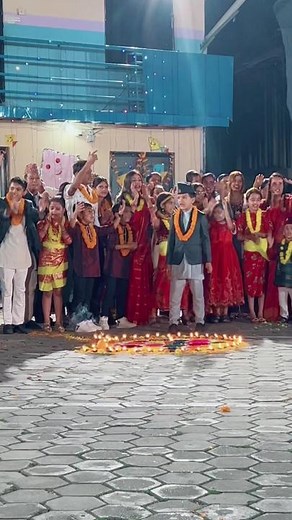 Traditional Night Ceremony with Children in Colorful Attire