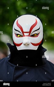 London, UK.  26 May 2018.  A man dressed as Yokai from Big Hero 6 joins cosplayers attending day two of MCM Comic Con at Excel in East London.   Thousands of fans of video games, comic books and other popular character take the opportunity to dress up as their favourite characters over the three day festival of pop culture.  Credit: Stephen Chung / Alamy Live News Stock Photo - Alamy