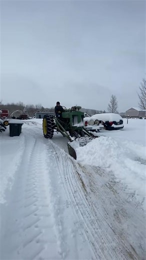 Our 1953 John Deere model 70 gas on #snow plowing duty | Shadow Ridge Farms