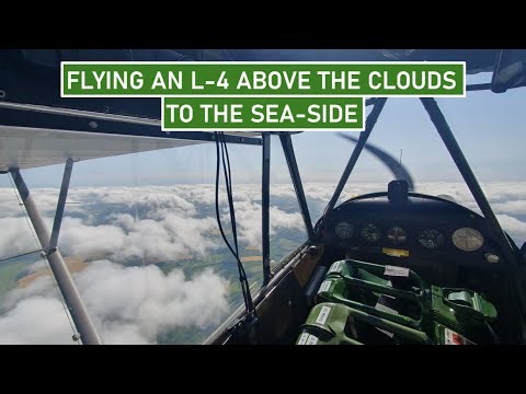 Pilot's Eye View - Flying a 1943 L-4 Grasshopper over the clouds to the Norfolk sea side | Piper Cub