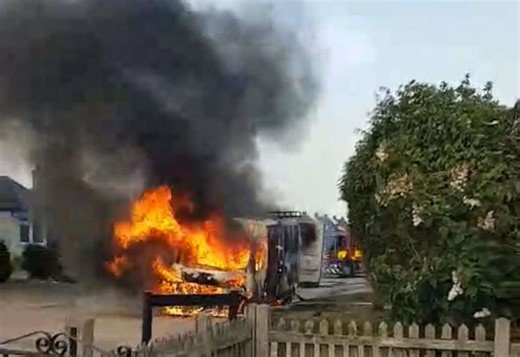 Dramatic footage shows flames engulfing van in residential street