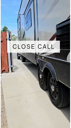 Do you use a spotter when you pull into and out of sites? It's always a good idea to have a spotter when you're pulling into or out of spots that aren't totally level. This could have damaged our rear stabilizer jacks significantly. Thankfully, we saw it before it happened and added the 2x4 that gave us just enough room to clear the curb. Have you had any close calls? >>>>>>>-----------------