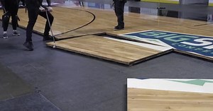 Preparing for Starch Madness: Arena crew transforms ice rink to basketball court