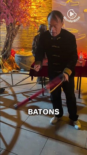 Wow! Mastering the Chinese Flower Stick Acrobatics