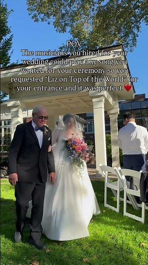 Liz on top of the world on string Quartet live at a wedding