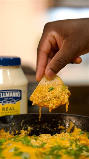 Hellmanns DISAPPEARING BUFFALO CHICKEN DIP RECIPE ——— Football season is back, y’all! 🏈 And you know that means it’s time to bring the heat with some epic game day snacks. Let me show you how to whip up this bold and Creamy Disappearing Buffalo Chicken Dip using @hellmannsmayonnaise #HellmannsPartner ———————— Hellmann’s Buffalo Chicken Dip Ingredients - 2 Cups finely chopped or shredded cooked chicken (details below) 1/3 Cup cayenne pepper sauce 1 Cup Hellmann’s Mayonnaise 1 Cup shredded chedda