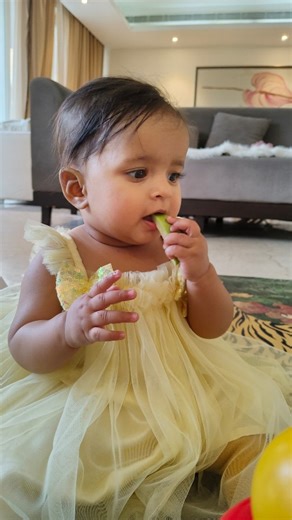 kritika jain on Instagram: "Not eating. Just exploring 🍃 At 9 months, a simple slice can become a whole learning experience, feeling textures, bringing it to the mouth, soothing sore gums, and understanding cause & effect ✨ This is sensory play, oral motor practice, and self-led exploration all rolled into one moment 🤍 No rush. No forcing. Just letting curiosity lead. Because sometimes, development looks like messy hands, wet cheeks, and a very focused baby 👶💫 💬 Mom check: Do you also let y