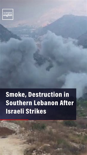 Smoke billows over Arab Salim in south Lebanon, as people survey damage from Israeli strikes after the Israeli military said it targeted Hezbollah infrastructure in the region.