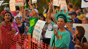 Large crowd of protesters gathers near Trump rally