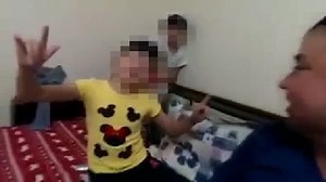 Dad teaches toddlers how to down vodka