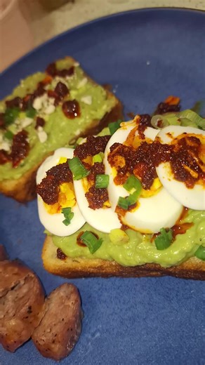 #whatyoucooking #avacadotoast #feta green onion #chili crunch oil boiled egg on #crecent bread. Chicken sausage stuffed with Gouda cheese and spinach