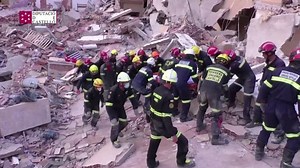 Spanish rescuers pull body from collapsed building, one still missing