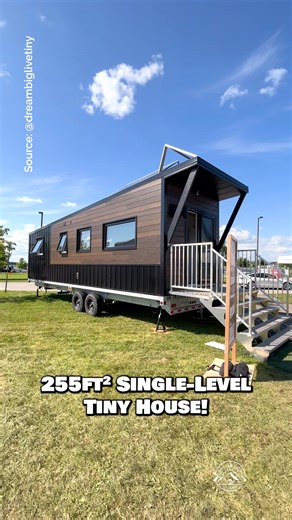 Welcome to the 30' "Nomad" tiny house on wheels by Canadian-based Minimaliste! This is their single-level towable tiny home that would make a great home on the road! Inside, there is a spacious living area with a couch & TV, a linear kitchen with apartment-size appliances, a dining booth that converts into a guest bed, a full bathroom with a small tub, & a private main-level bedroom with built-in storage! For more information on this model, please reach out to Minimaliste! #tinyhouse #tinyhome #