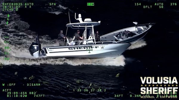 First responders jump on out-of-control boat with unresponsive man on board
