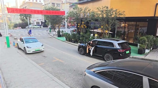 Electric car executes a perfect parallel park without a driver