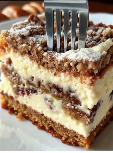 Neiman Marcus Cake A rich, buttery delight with a creamy cheesecake layer and crunchy pecan topping — pure Southern comfort! 🤎🍰 Ingredients: For the Bottom Layer: 1 box yellow cake mix (just the dry mix) 1 large egg ½ cup unsalted butter, melted For the Cream Cheese Layer: 8 oz cream cheese, softened 2 large eggs 3 ¾ cups powdered sugar 1 tsp vanilla extract For the Topping: ½ cup chopped pecans Optional: extra powdered sugar for dusting Instructions: Preheat oven to 350°F (175°C) and grease a