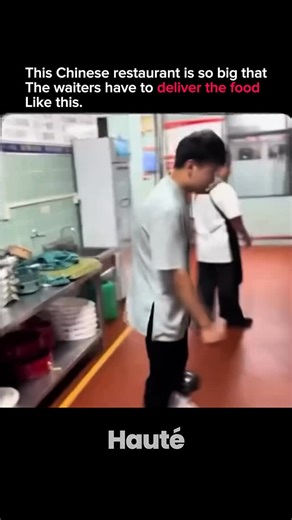 @hauteamerica on Instagram: "This Chinese restaurant is so massive that waiters can’t rely on traditional serving methods-instead, they use innovative ways to deliver food across the large space. Whether it’s by zipping dishes along conveyor belts, using robot servers, or even gliding trays on tracks suspended above the tables, the unique system helps them efficiently serve guests seated far apart. The size and scale of the restaurant make it an experience in itself, turning even the act of gett