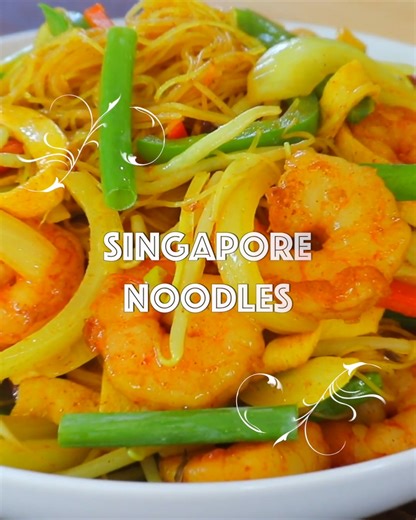 Once You Try These Singapore Noodles, You’re Hooked 😍 Smoky, curry-spiced, and loaded with shrimp—this Cantonese-style Singapore Noodles dish comes together fast and hits every craving. You’ll need: rice vermicelli noodles, shrimp, curry powder, bell peppers, bean sprouts, scallions, eggs, and more. 📝 Full video printable recipe in the comments! 💛 Craving this? Save it & share with a friend! #singaporenoodles | CiCi Li