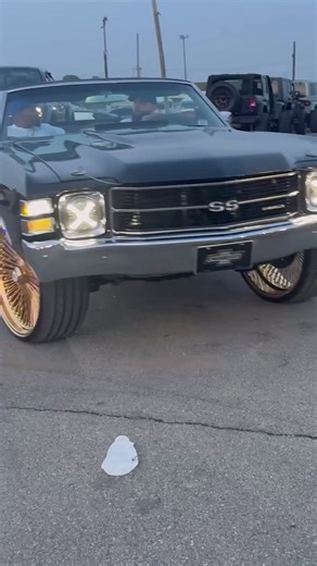 Black Chevy Chevelle SS vert on gold 24’s riding